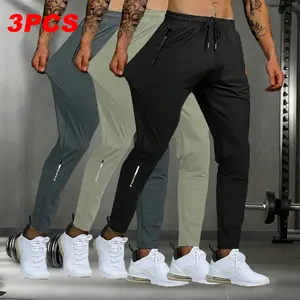 Men’s straight-leg pants made from stretchy ice‑feel fiber fabric, breathable quick‑dry casual athletic long pants for all seasons, featuring a drawstring waist and zippered side pockets with letter print, suitable for golf, fishing, basketball, camping,