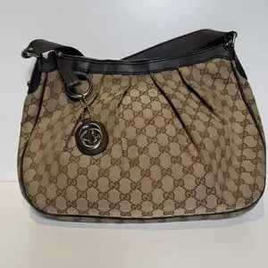 Pre-owned GUCCI Canvas Shoulder Bags Sukey hobo bag in the GG with leather trim GG55JX