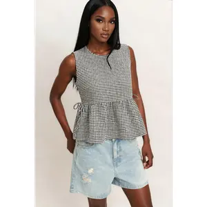 Kailee Gingham Sleeveless Peplum Top in Black