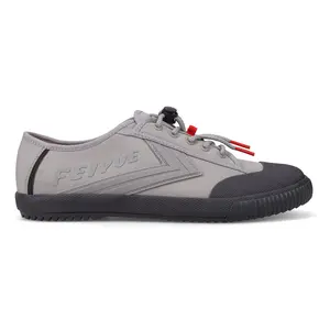 Feiyue EXO durable performance shoes in grey. Tight-weave, tear-resistant ripstop nylon upper, molded chevrons for lateral stability, a toggle lace closure for a more secure fit, and reflective details. Great for parkour, marital arts and training