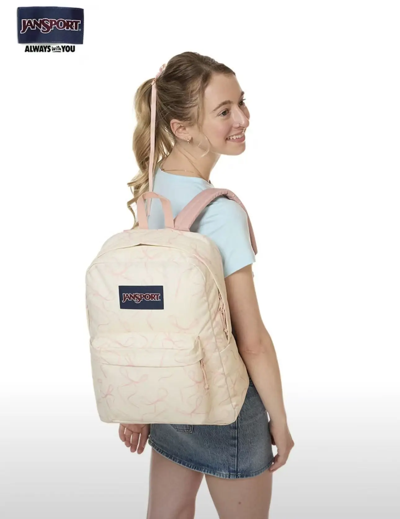 The JanSport SuperBreak Plus backpack is a durable everyday backpack suitable for work and travel. It features a 15-inch padded laptop compartment and a built-in water bottle pocket, perfect for sports, outdoor, and campus use.-Rows Of Bows