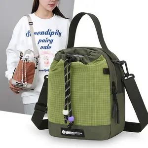 Includes shipping fee. New nylon multifunctional bag—stylish single-shoulder design, fashionable crossbody, trendy color-block mini phone pouch.
