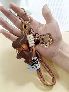 French Bulldog Keychain with Star Charms & Woven Rope Wrist Strap Keyring Dog Star Bell Pendant Black Brown PU Leather Bag Charm Chain Anti-lost Braided Wrist Lanyard Dog Key Holder for Keys,Wallets & Backpacks, Keychain Attachment