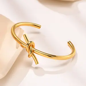 VNOX Niche Knot Open Hand Cuff Bracelet, Stainless Steel Jewelry Gold Plated Non Tarnish Hand Chain Fashion Accessory for Women