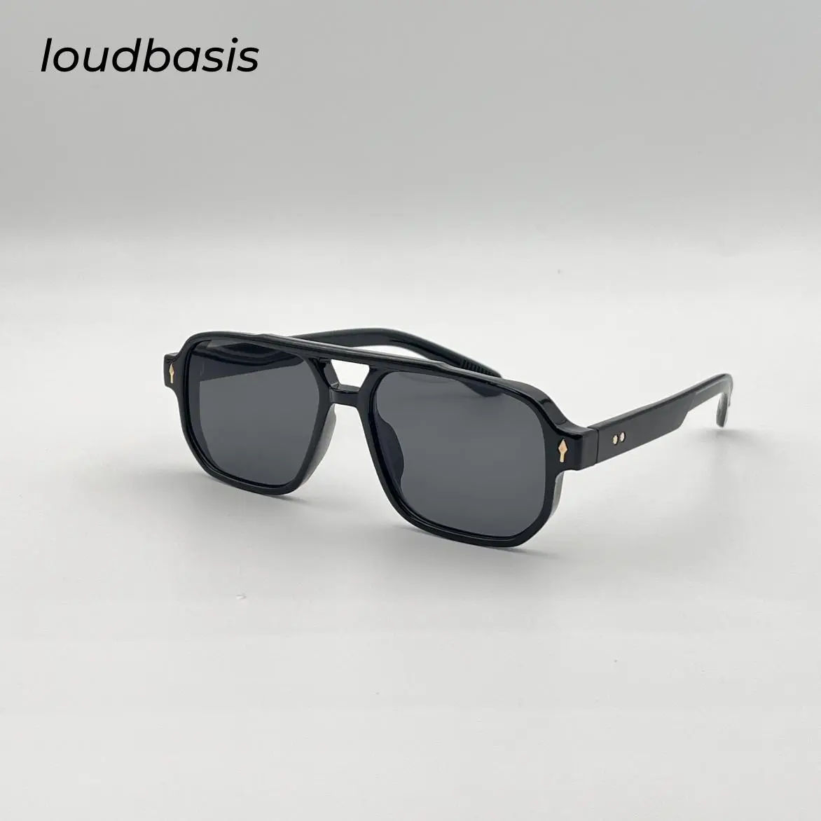 Black-framed sunglasses slim the look, retro and trendy cool style sunglasses