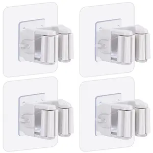 Broom Holder Wall Mount, 4 Pack  Version Adhesive Mop and Broom Holder Wall Mount, Super Anti-Slip Broom Hanger Mop Organizer Wall Hanging for Bathroom, Kitchen, Laundry Room closet laundry room Installation Smooth Hangable White broom storage rack