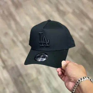 New Era 9FORTY LA Dodgers All-Black Adjustable Cap – Tonal Black LA Logo Curved Brim Hat