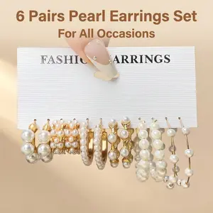 Pearl & Gold Hoop Earring Set  Elevate your everyday look with timeless elegance.