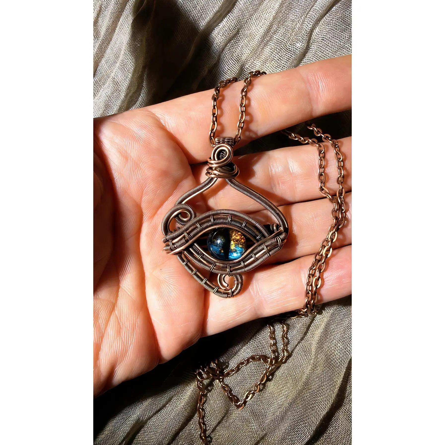 Eye of the Storm Necklace with Copper Chain and Blue Stone Pendant