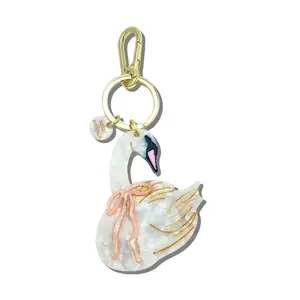 Solar Eclipse — Hand-Painted Bow Swan Bag Charm