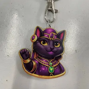 TeensandToddlersclub Queen Zuri Keychain with Gold Accents Featuring Purple Cat Design and Elegant Jewelry