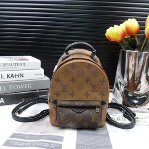 Pre-owned Louis Vuitton Coated Canvas Backpacks Palm Springs Mini Monogram Reverse Backpack T10273949
