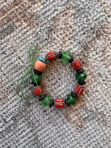 Antique Bead Designer Bracelet with Vibrant Red Green and Orange Beads and Green String