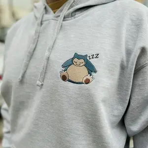 Sleeping Snorlax Custom Embroidered Sweatshirt, Snorlax Sleeping Pokemon Hoodie, Snorlax With Pokeball Embroidered Hoodie, Pokemon Fans Gift Shirt, Snorlax Sweatshirt, Pokemon Snorlax Hoodie, Pokemon Collections For Fans