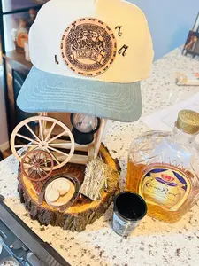 Custom EM94 high-profile snapback with engraved leather patch and western-inspired design