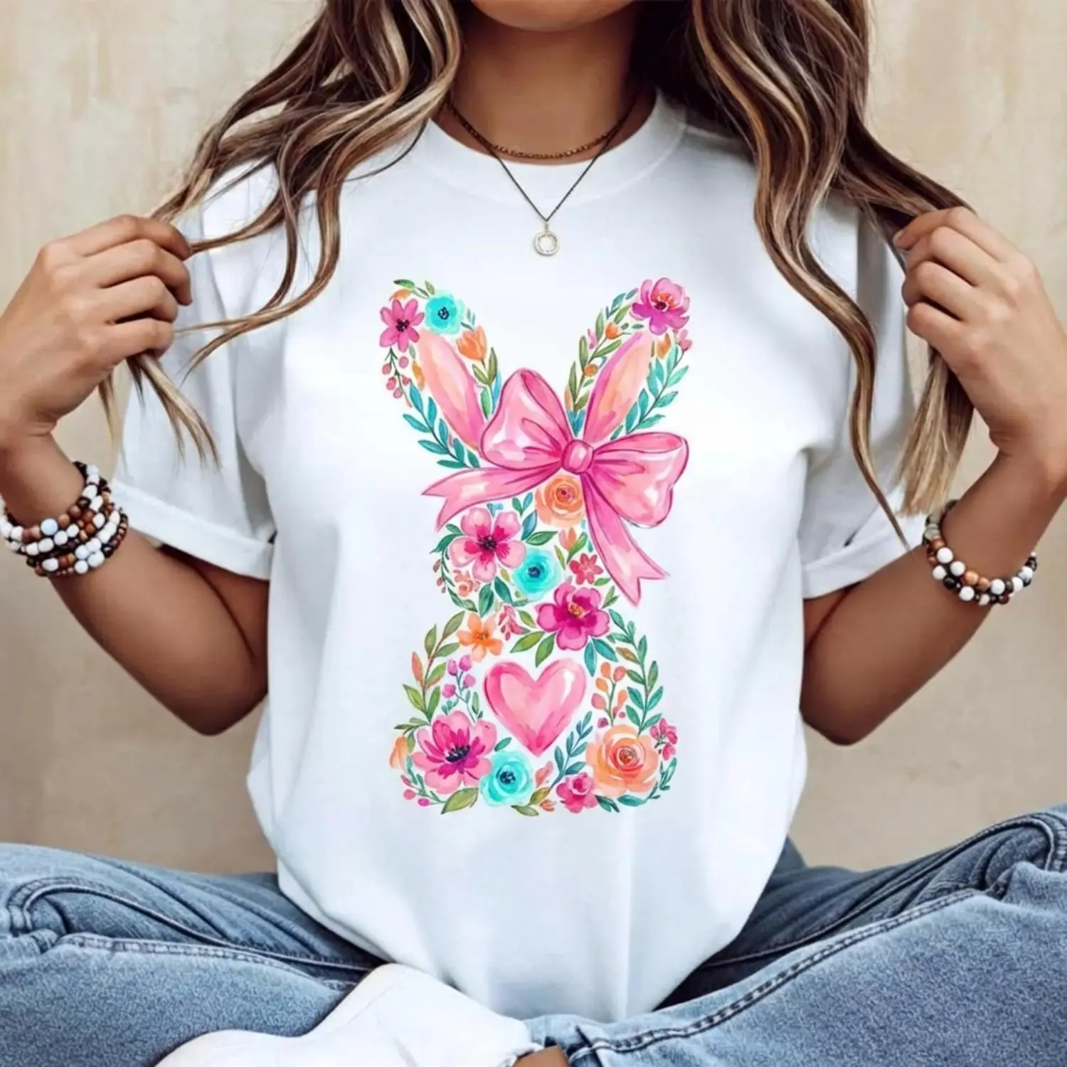 Women Casual Round Neck Short Sleeve T Shirt Featuring White Easter Bunny with Pink Bow and Colorful Swirl Print Perfect for Spring Festival and Holiday Celebrations