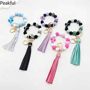 European and American cross-border beaded silicone cross leopard print wood bead bracelet bracelet PU fringed keychain