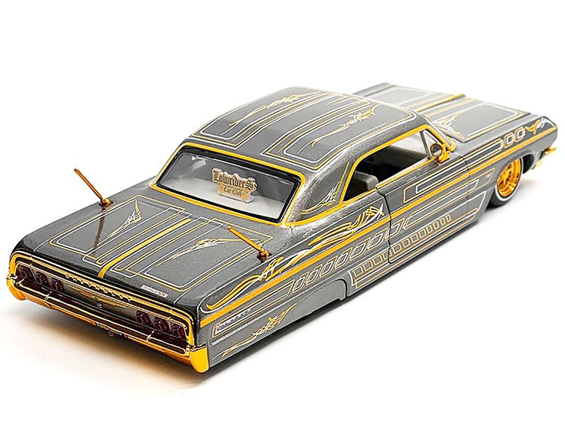 1964 Chevrolet Impala SS Lowrider Gray Metallic with Gold Graphics "Lowriders" "Maisto Design" 1/26 Diecast Model Car by Maisto