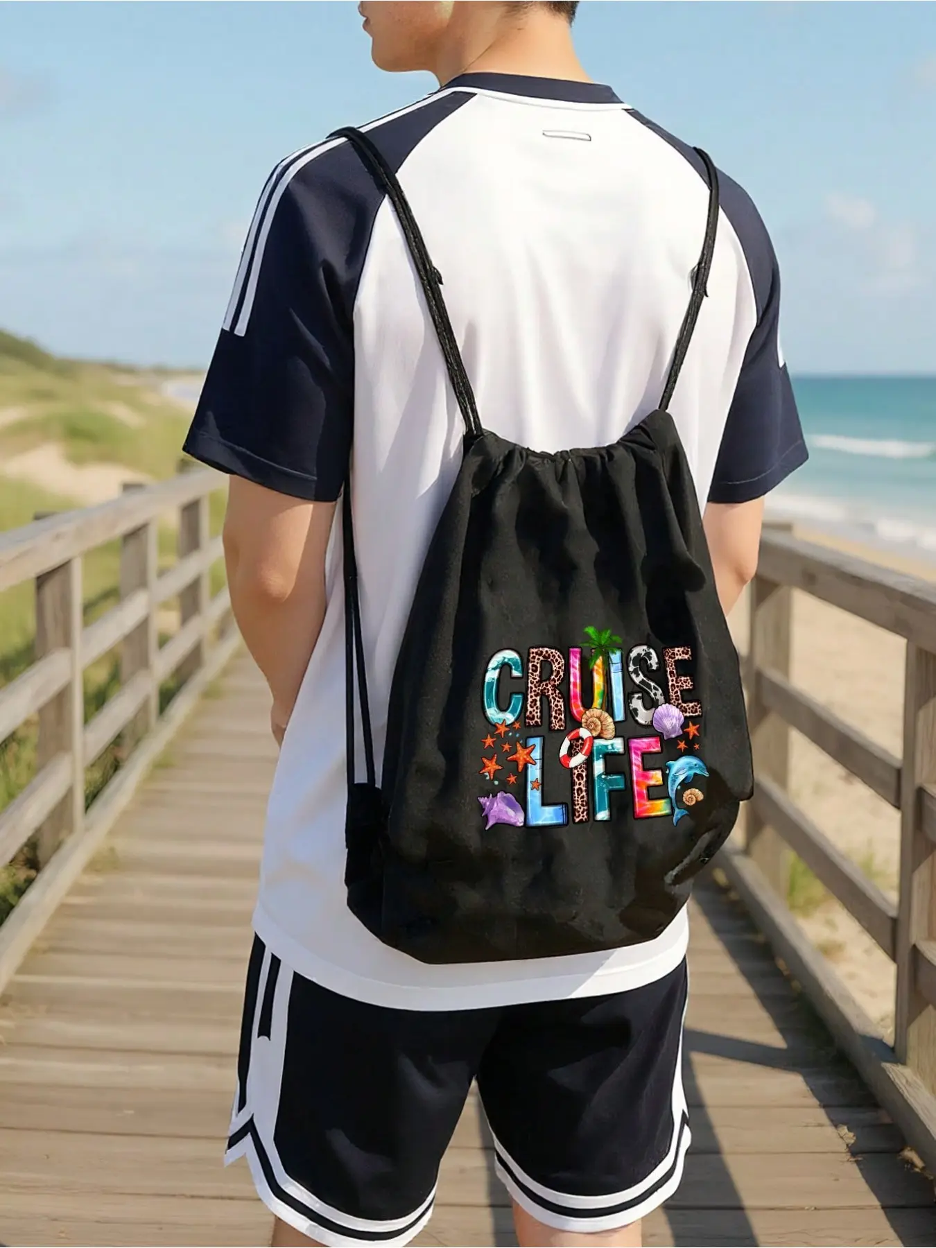 Cruise Life print drawstring backpack with a matching small bag. Foldable design with adjustable straps and multiple pockets. Spacious and multi-functional, ideal for school, shopping, sports, travel, beach outings and gifting.