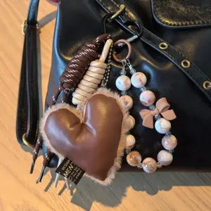 Creative Leather and Plush Heart-Shaped Braided Rope Bag Accessory, Keychain Charm for Sports & Outdoor Protective Gear Use