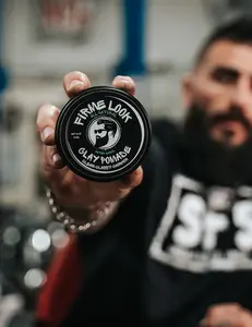 Firme Look Clay Pomade.  All-natural with low shine and a strong flexible hold. Kaolin Clay, Grape Seed Oil, Shea Butter, Beeswax, Jojoba Oil, Cherry Kernel Oil, Kokum Butter, Coconut Oil, Vitamin E, Castor Oil, Argan Oil, and Lanolin Oil. Gel Haircare