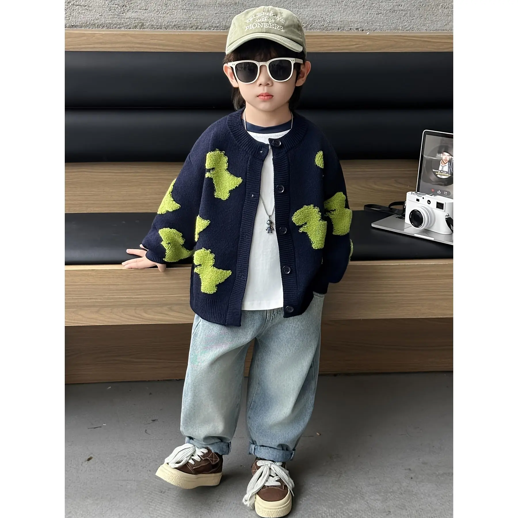 Navy Blue Cardigan Sweater for Boys Featuring a New Dinosaur Design for Spring And Autumn, with a Button-Up Front. This Stylish And Adaptable Knit Jacket Is Suitable for Small to Medium-Sized Boys; Select The Size Based on Their Height