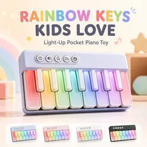 Mini pocket piano light-up keyboard, children’s toy, portable handheld instrument, compact numeric keyboard, portable travel sensory music toy gift
