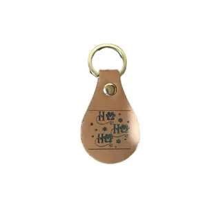 Ho Ho Ho Key Chain - Festive Design with Gold Ring and Engraved Text for Holiday Gifts