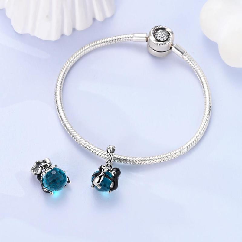 MULA S925 Silver Plated Dancing Penguin Charm with Blue Glass Crystals and Enamel Detail - Compatible with Pandora Bracelets, makes a cute animal jewelry gift for girls, teens and women
