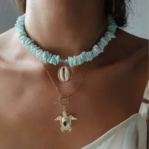 Gold Sea Turtle Layered Necklace for Women, Light Blue Shell Choker with Cowrie Shell Pendant, Boho Ocean Beach OT Toggle Clasp Emerald Green Crystal Footprint Charm Jewelry Gift