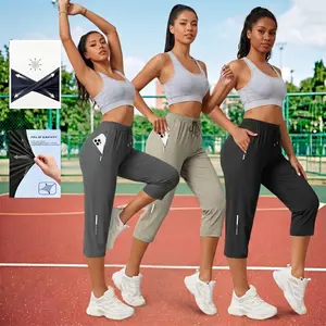 Women’s summer cooling sun-protection three-quarter athletic pants — high-waisted with drawstring, highly elastic, quick-drying, zippered pockets, reflective stripes; versatile for running, fitness, outdoor activities, and casual wear.