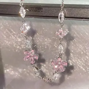 Pink cherry blossom bow bracelet women's ins niche light luxury temperament high-end cool girlfriend hand jewelry trend