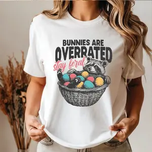 Bunnies Are Overrated T-shirt, Funny Feral Raccoon Easter Shirt, Retro Humor Easter Saying Graphic, Soft, Full Size.