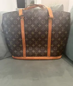 Pre-owned Louis Vuitton Canvas Tote Bags Monogram Babylon Tote with Leather Handles and Zip Closure