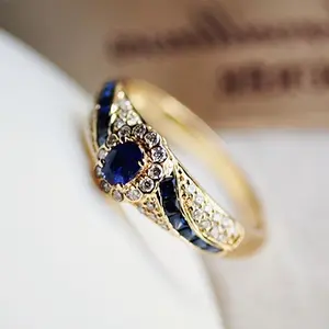 1pc Elegant Golden-Tone Alloy Ring with Synthetic Cubic Synthetic Synthetic Zirconia Stones - Intricate Blue & Clear CZ Design for Women, Versatile Everyday Jewelry for Casual Formal Wear,Suitable for both men and women