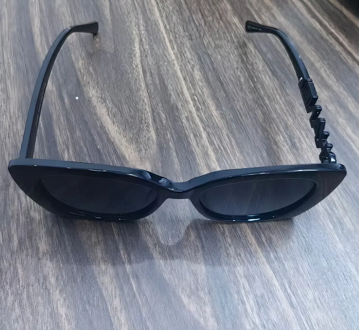 Elegant Black Sunglasses with Unique Design and Comfortable Fit for Everyday Wear