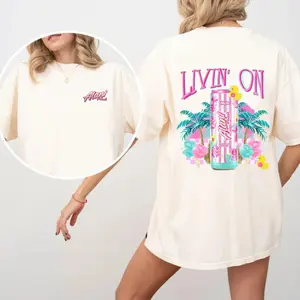 🍬 "Livin’ on Alani Nu Cotton Candy" Graphic T-Shirt – Sweet Energy Drink Aesthetic Tee, Oversized Cotton Crewneck, Y2K Cute Streetwear Shirt, Summer Outfit for Women & Men, Gift for Alani Lovers, TikTok Viral Graphic Tee