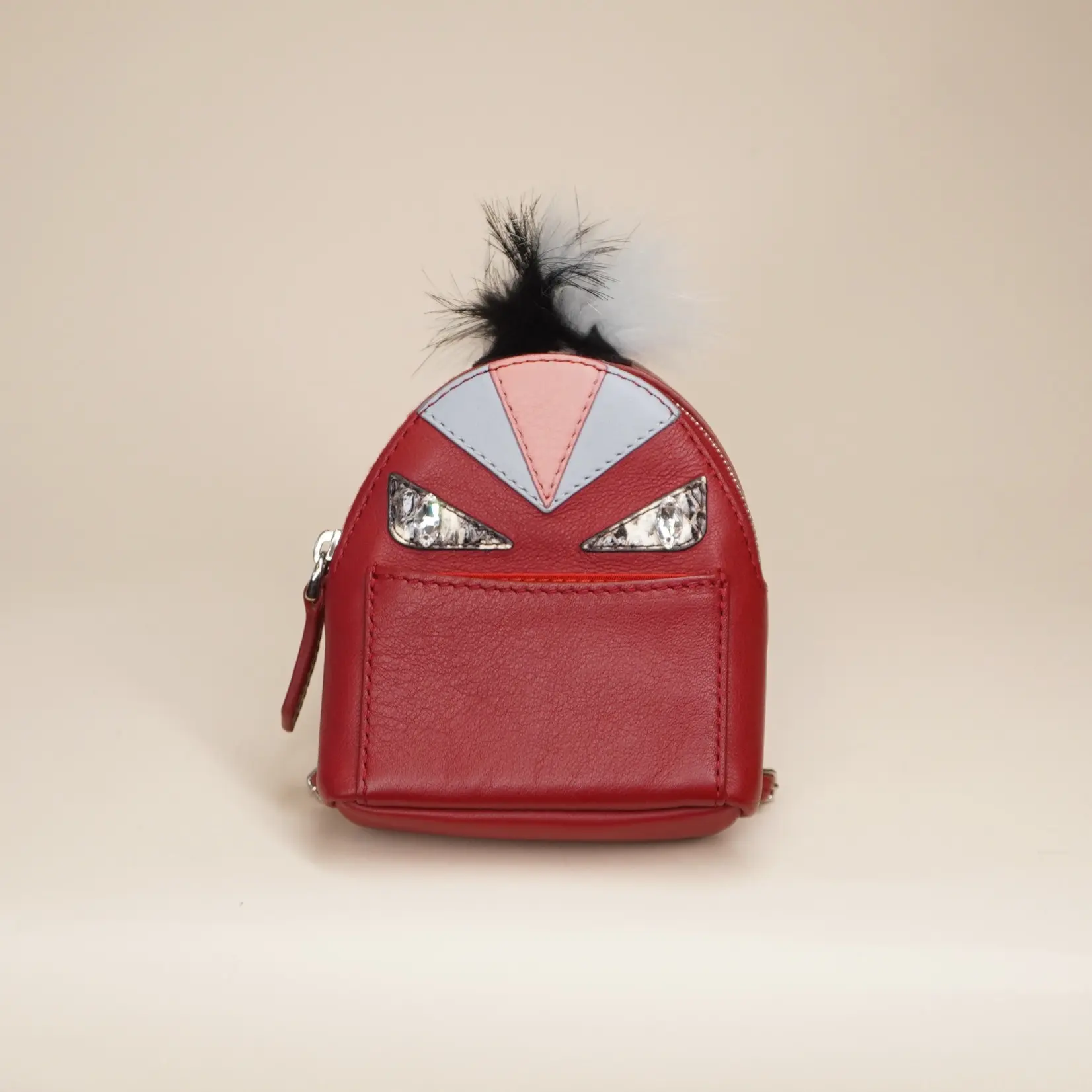 fendi backpack mini monster Nylon with Leather and Fur Lined canvas interior with a zipped compartment Fendi Black Nylon Mini Monster