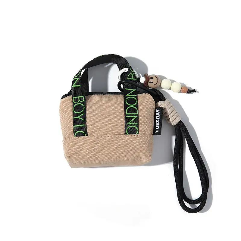 Light brown handbag + strap + pendant