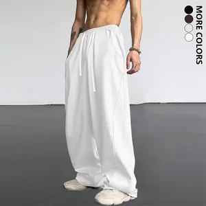 Men’s heavyweight casual pants for autumn/winter, featuring an elastic waistband and drawstring; sporty casual wear, stylish long pants with a modern design, soft fabric, versatile athletic trousers.