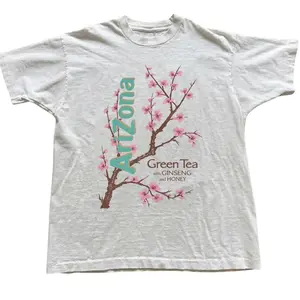 AriZona Green Tea Cherry Blossom Can Parody Graphic T-Shirt, Iconic Teal Vertical Typography with Pink Floral Branch Illustration, Unisex Off-White Streetwear Tee, Retro Aesthetic Outfit