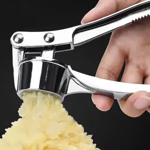 Garlic press, household garlic pounder, large garlic press, kitchenware, manual garlic mincer, garlic crusher.