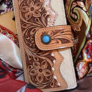 Tooled leather and cowhide wallet