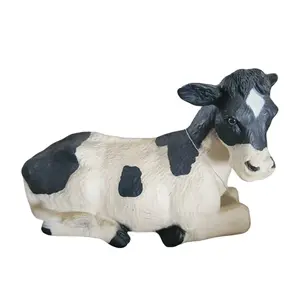 Sitting cow decoration