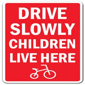 SignMission  Drive Slowly Children Live Here Sign