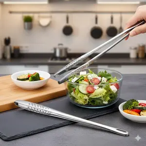 Stainless Steel Long Handle BBQ Grill Tongs. Heat Resistant & Rustproof with Extended Grip for Safe Handling. Serrated Non-Slip Head Firmly Grasps Steak, Bread. Versatile Flipping Tool for Grilling, Cooking, Kitchen Must-Have Utensils.