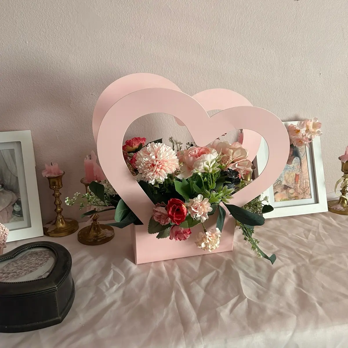 Mixed floral arrangement in pink heart box