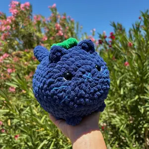 Crochet Loaf Cat with Attached Flower Headband - 100% Polyester Yarn - 7” x 8”