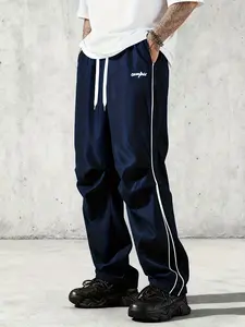 Men’s loose-fit striped patchwork casual pants, comfortable western-style trousers for outdoor activities, trendy fashionable trousers