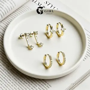 GGIRL A Minimalist, Sweet-And-Edgy Everyday Earring Set Perfect For Layering, Featuring Small Hoop Earrings And Dangling Studs. Designed For Cool Girls With Multiple Piercings, This Is The Perfect Gift For Earring Enthusiasts And Layering Fans